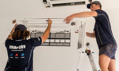 2 Technicians Installing Ceiling Vents For A Home Aircon Systems