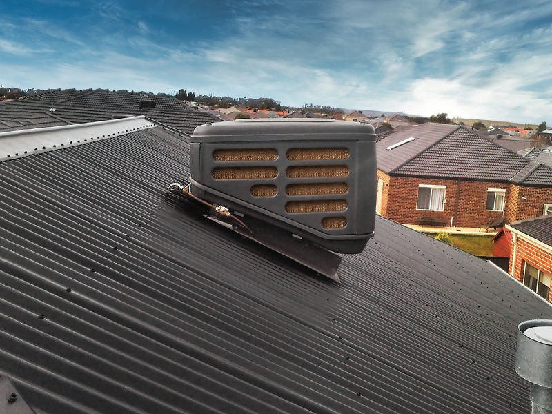 Side view of an Evaporative Cooler installed on a roof