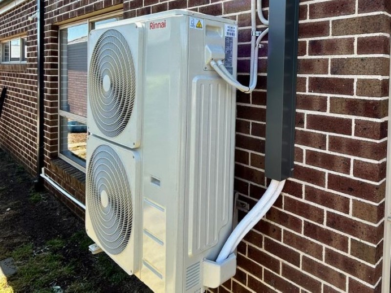 Ducted Reverse Cycle Air Conditioner Installed On Wall