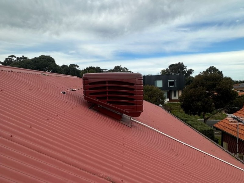 Terra Red Coloured Evap Cooler On Red Roof